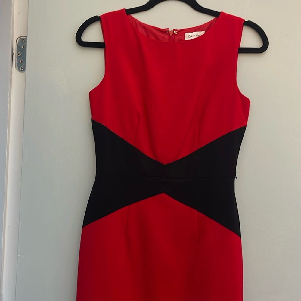 Beautiful red and black cocktail dress!
Very flattering on!